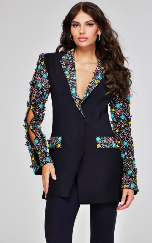 model wearing Jovani 26304 black dress with floral embellishments, front view