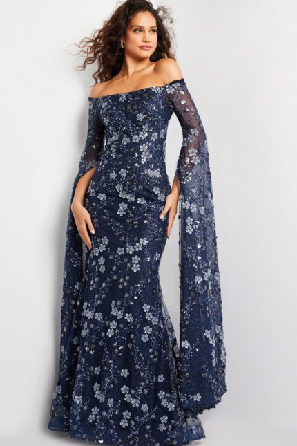 Model wearing Jovani 26330 navy gown, front view with floral appliqués.