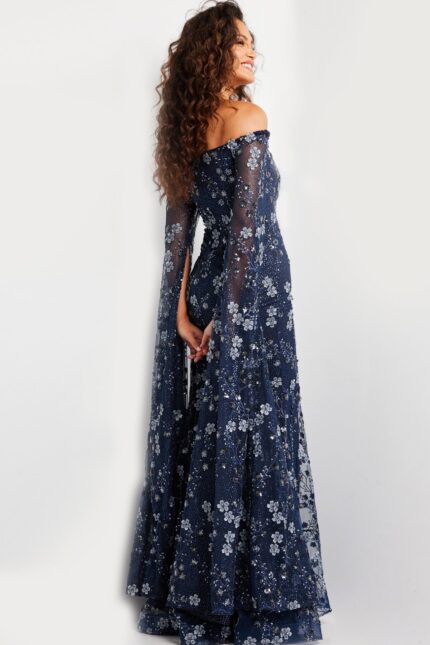 Model wearing Jovani 26330 navy gown, back view showcasing flowing sleeves.