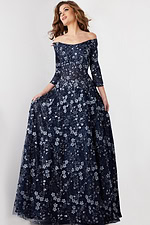 Model wearing Jovani 26331 navy gown front view with floral embroidery.