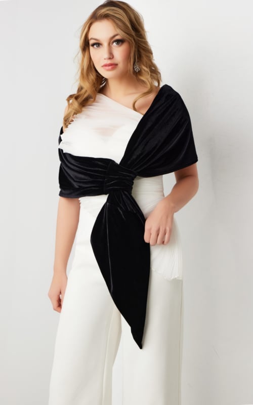 Model wearing Jovani 2750 black and white one-shoulder dress from the front view.