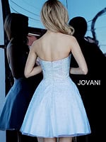 Back view of model wearing Jovani K2830 light blue dress featuring embellishments.