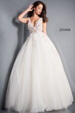 Model wearing Jovani 3110 ivory ballgown, front view with embroidery focus.