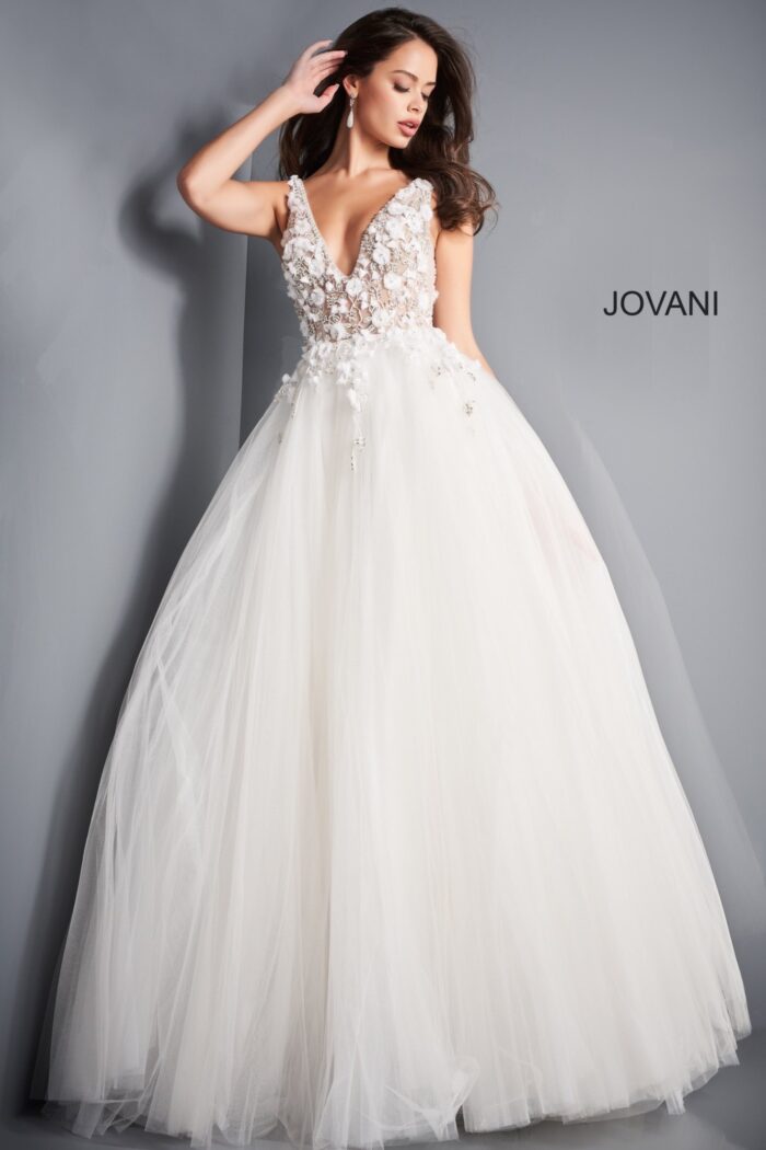 Model wearing Jovani 3110 ivory ballgown, front view with embroidery focus.