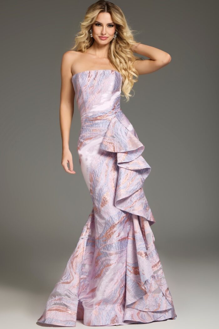 Model wearing Jovani 31137 strapless pink mermaid dress with side ruffles