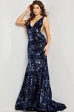 Model wearing Jovani 32581 navy mermaid gown, full-length front view.