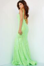 model wearing Jovani 3263 dress in neon green back view side angle