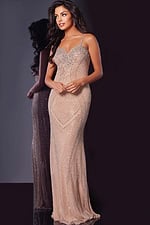Model wearing Jovani 34312 nude gown, showcasing fitted silhouette and detailed beadwork.