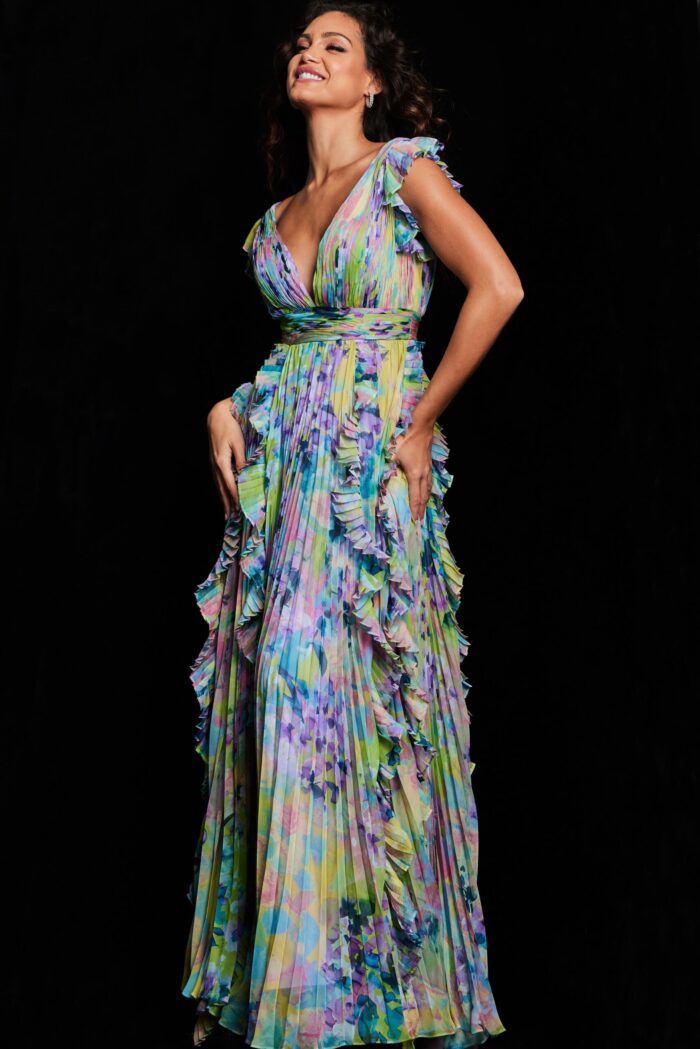Front view of model wearing Jovani 34412 with ruffled print design and flutter sleeves