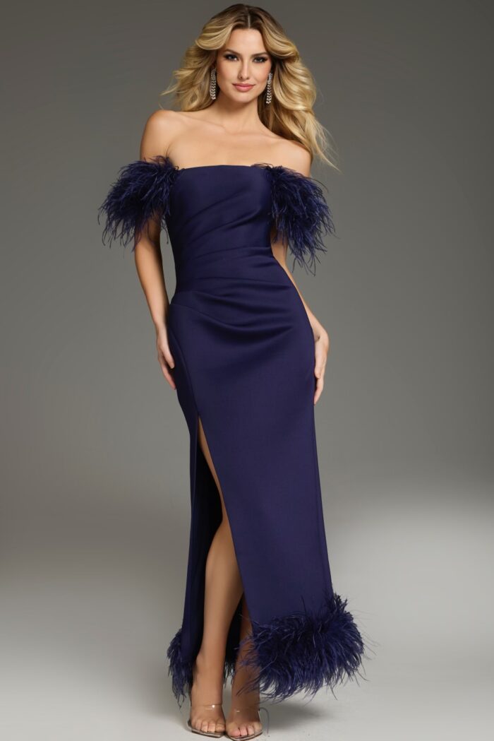 Model wearing Jovani 36375 navy off-the-shoulder dress with feather details