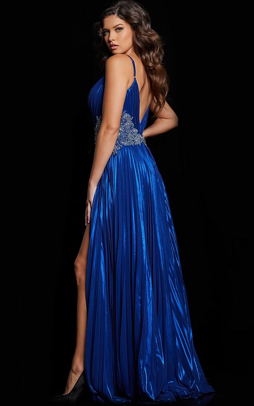 Model showing the back of 36442 royal blue dress featuring open back design.