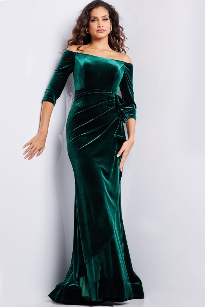 model wearing 36458 full-length green velvet dress with side ruching and off-the-shoulder neckline