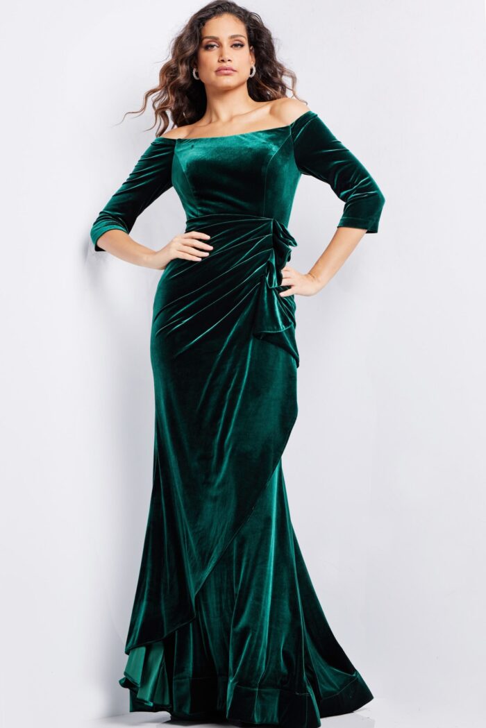 model in 36458 green velvet dress featuring three-quarter sleeves and floor-length design