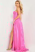 Model in Jovani 36461 pink dress, side profile highlighting pleated design