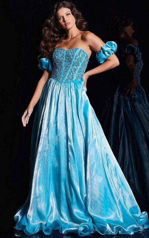 Model wearing Jovani 36591 blue ball gown with sweetheart neckline and off-the-shoulder puff sleeves, front view.
