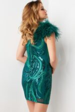 Back view of Jovani 36713 green sequined mini dress with one-shoulder feather detail.