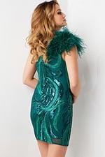 Back view of model wearing Jovani 36713 Green dress with striking feather detail.