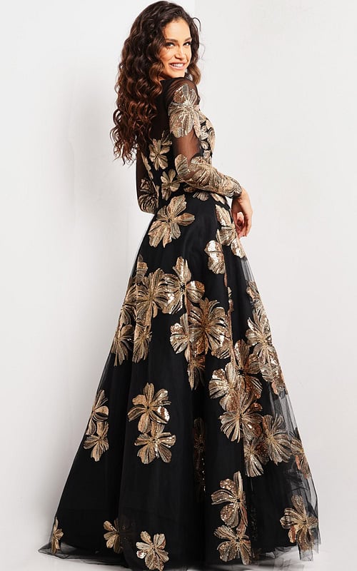Back view of model wearing Jovani 36716 black gown with gold floral embroidery.