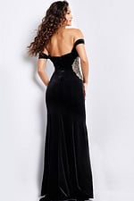 Model wearing Jovani 36733 black off-the-shoulder gown, back view.