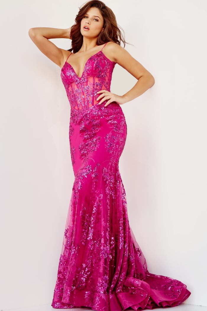 Model wearing Jovani 3675 pink mermaid gown with lace detailing, front view
