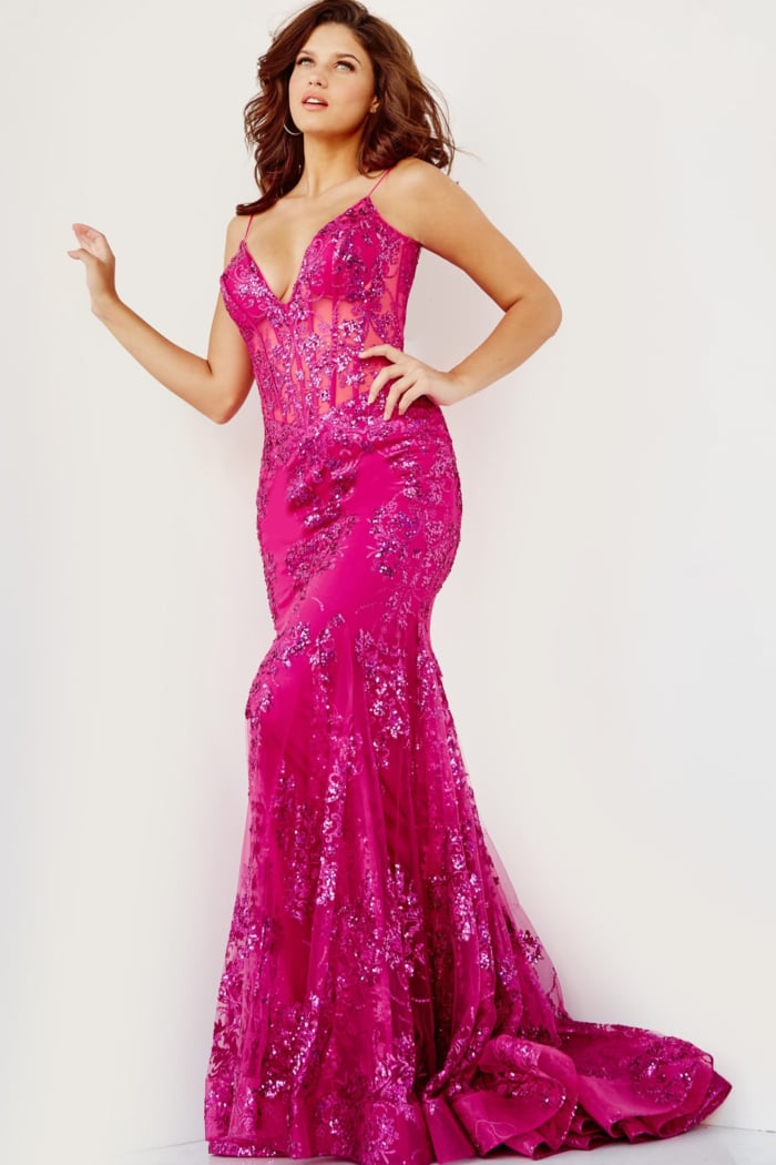 Model wearing Jovani 3675 pink mermaid gown with lace detailing, back view