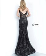 Model showcasing the back of Jovani 3675 in black with floral sequin detailing.