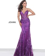 Model wearing Jovani 3675 purple mermaid gown with lace detailing, front view
