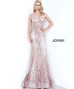 Model wearing Jovani 3675 rose gold mermaid gown with lace detailing, front view