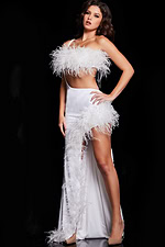 Model showcasing Jovani 36858 white gown with feather details and high slit, front view.