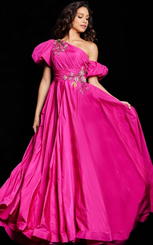 Model wearing Jovani 36872 fuchsia gown showcasing A-line silhouette and floral embroidery, front view.
