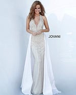 Model wearing Jovani 3698 nude gown with V-neckline and beadwork.