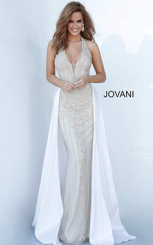 Model wearing Jovani 3698 nude gown with V-neckline and beadwork.