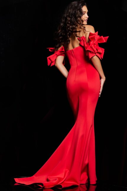Back view of Jovani 36997 red mermaid gown showcasing off-the-shoulder design and bow details.