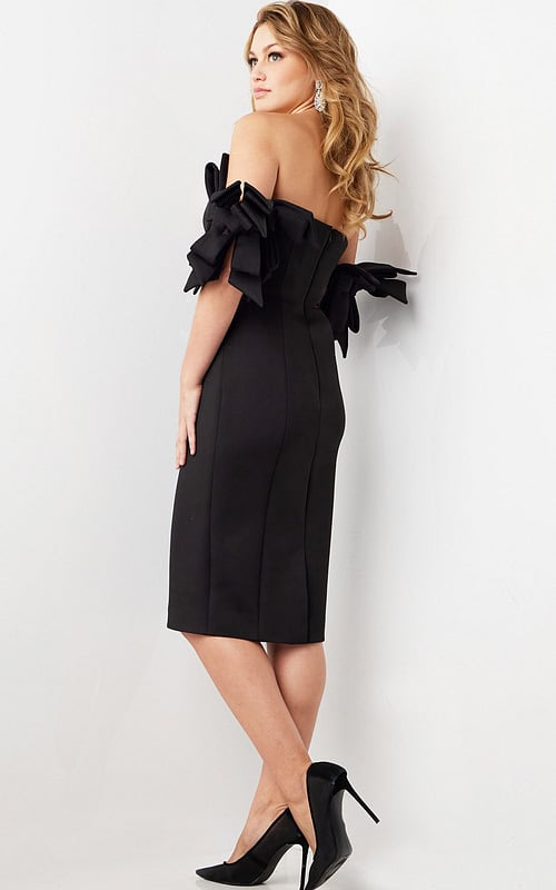 Back view of model wearing Jovani 36998 black midi dress showing the sleek silhouette.