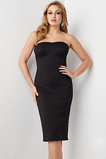 Model wearing Jovani 36998 classic black midi dress with off-the-shoulder neckline.