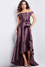 Model wearing Jovani 37014 brown dress, showcasing the full length and elegant layered skirt.