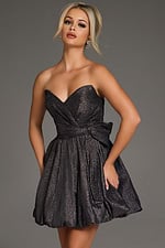 Model wearing Jovani 37017 dress in black with bubble hem, alternate front view