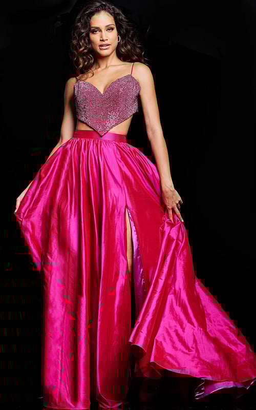 Model wearing fuchsia Jovani 37045 dress with embellishments and a high slit