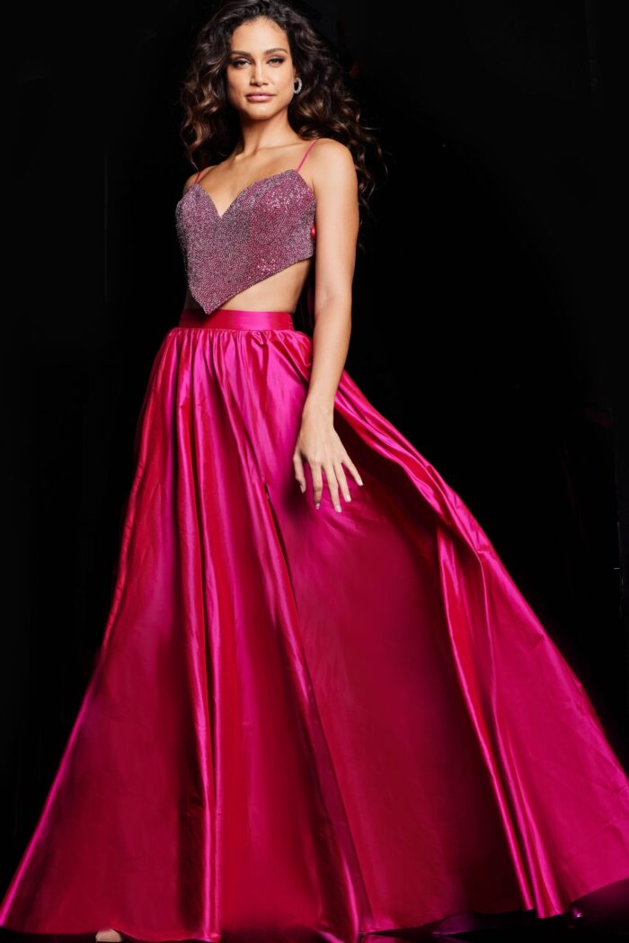 Model showing back of Jovani 37045 fuchsia dress with flowing skirt