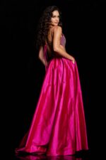 Elegantly posed model in Jovani 37045 fuchsia gown