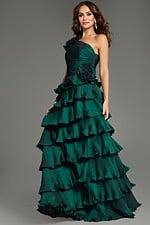 Model showcasing Jovani 37065 vibrant green gown, side view with elegant tiered design.