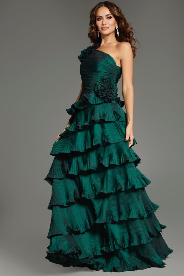 Model showcasing Jovani 37065 vibrant green gown, side view with elegant tiered design.