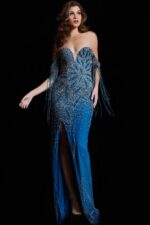 Model wearing Jovani 37073 blue dress featuring beaded fabric and a high slit