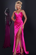 Model wearing Jovani 37079 fuchsia gown with sweetheart neckline and high slit, front view.