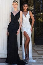white beaded black gown with plunging neckline and slit - two girls front, blonde updo brunette hand hip