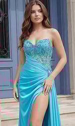 Front view of a strapless evening gown with a beaded bodice, draped waist, and high slit