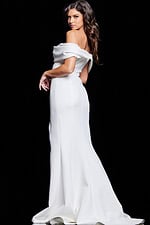 Model showing back of Jovani 37148 white dress with off-the-shoulder neckline.