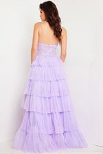 Back view of model wearing Jovani 37190 lilac gown with tiered tulle skirt.