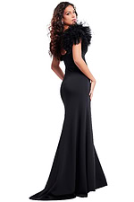 Model wearing Jovani 37196 black gown from the back