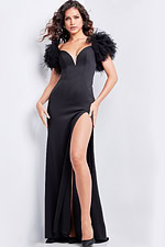Model wearing Jovani 37196 black gown with sweetheart neckline and high slit